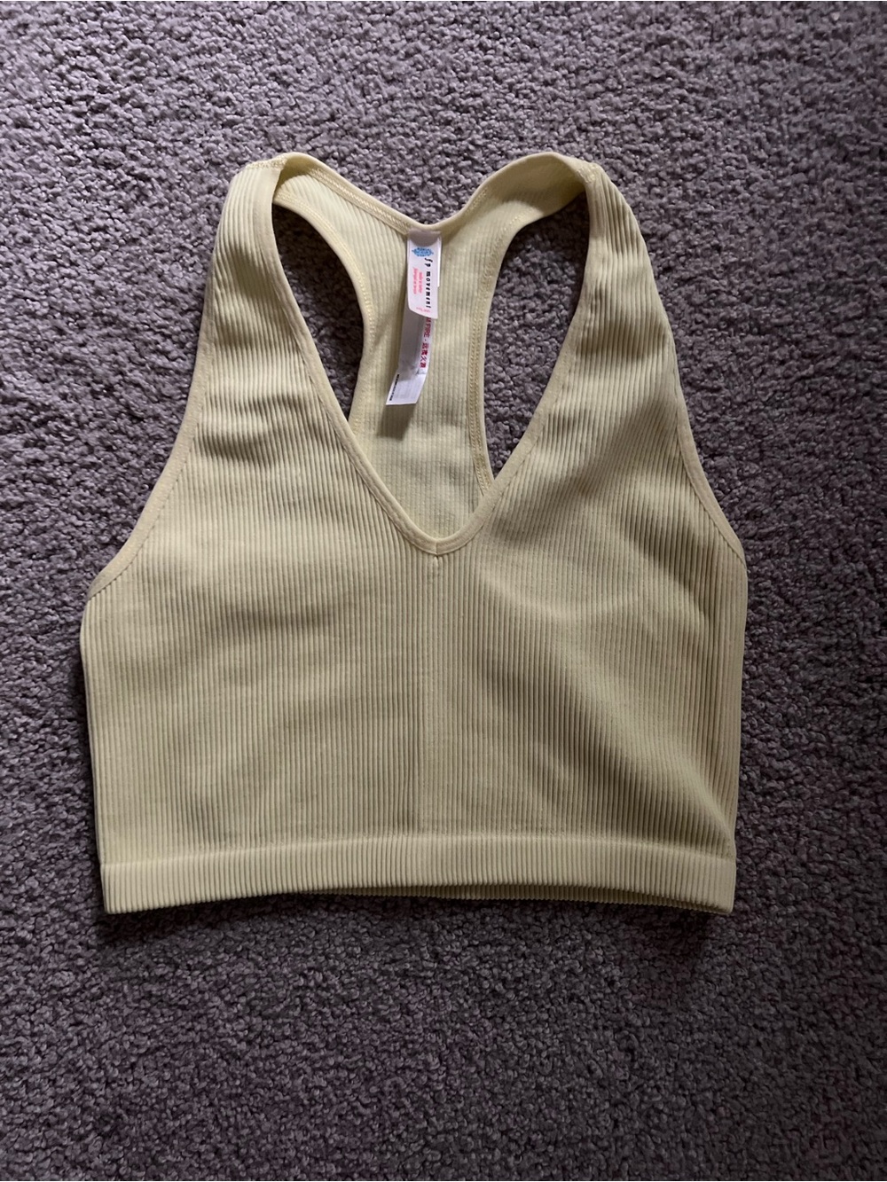 FP Movement by Free People Ribbed V-Neck Racerback Bralette in Pale Yellow